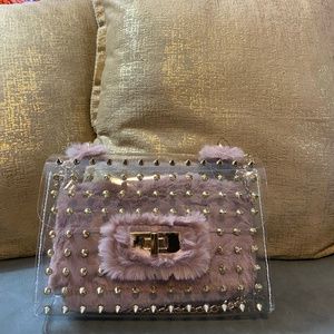 Clear clutch with pink wallet